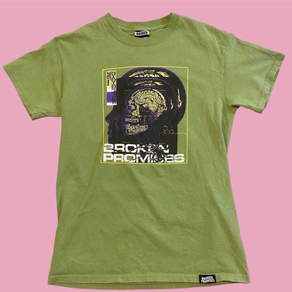 broken promises green graphic tee